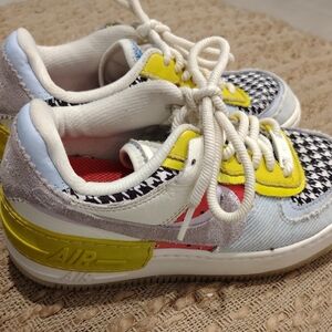Nike Kids Sneakers in Yellow, Red, and Black Houndstooth